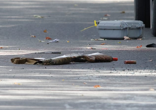 A shotgun and shotgun shells lie on the ground at the scene of a shooting where a police officer was shot outside a Yom Kippur gathering at Sons of Jacob Synagogue in Belleville, Ontario, Canada, September 21, 2026.