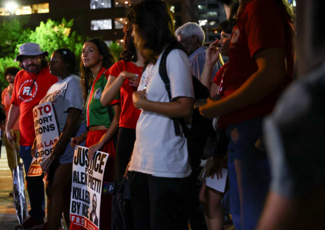Activists hold an emergency protest a day after an Immigration and Customs Enforcement (ICE) agent shot and wounded a man from Venezuela who, according to his lawyer, was working as a DoorDash driver, at the Texas State Capitol in Austin, Texas, US, September 21, 2026.