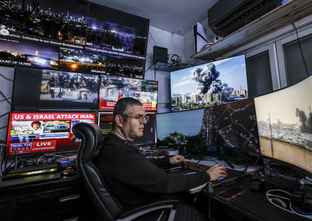 An intelligence analyst overseeing open-source and classified intelligence.