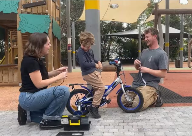 Shai Sheinfeld and Roy After with 5-year-old Ziv Cohen designing a bike for him for the Helen Hamlyn Center for Design’s 2026 Fixperts Awards.