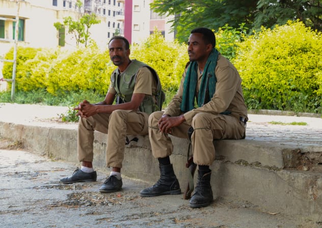 Members of the Tigrayan forces sit along a street as they patrol as tensions intensify after the forces launched a major offensive against the federal government in multiple locations, in Mekele, Tigray Region, Ethiopia, September 24, 2026.