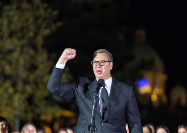 Serbian President Aleksandar Vucic waves to citizens outside the Presidency of Serbia moments before formally submitting his resignation, ending his second and final five-year term in office, in Belgrade, Serbia, September 27, 2026.