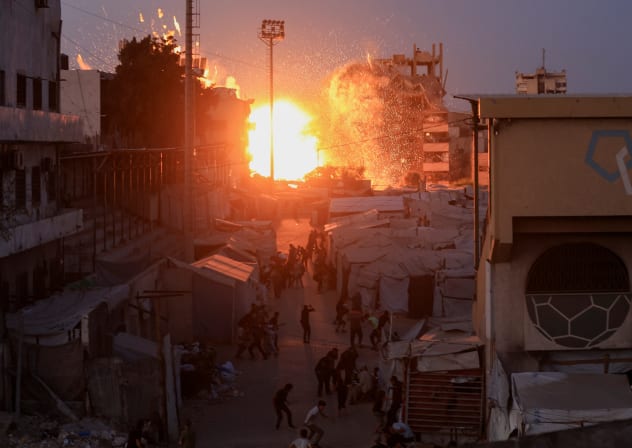ILLUSTRATIVE: Smoke and flames rise after an Israeli airstrike hit a mosque in Gaza City, July 28, 2026