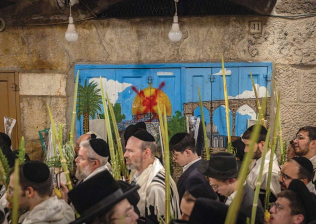 Praying at the entrance to the Temple Mount on Sukkot, Sept. 29.