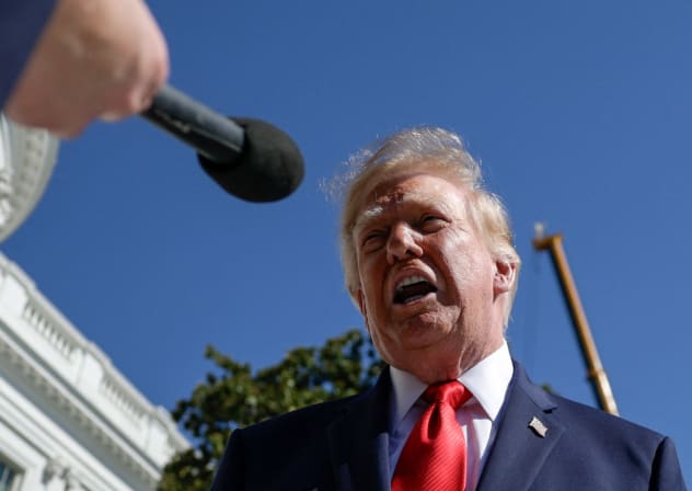 US President Donald Trump speaks to reporters before boarding Marine One as he departs for Denton, Texas, on the South Lawn of the White House in Washington, US, October 1, 2026.