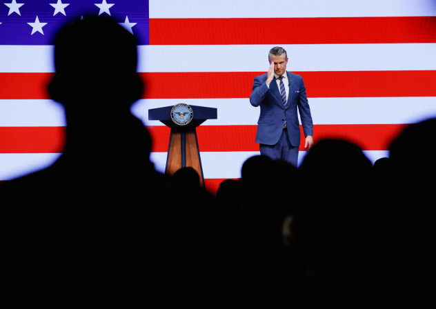 US Defense Secretary Pete Hegseth salutes as he delivers his 2026 "State of the Force" address to US junior officers and enlisted leaders at Marine Corps Base Quantico in Quantico, Virginia, US, September 30, 2026.