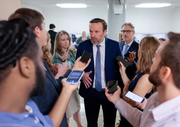 US Senator Chris Murphy (D-CT) speaks with reporters on the way to a vote on the "Stop Insider Trading Act" on Capitol Hill in Washington, DC, US, September 30, 2026.