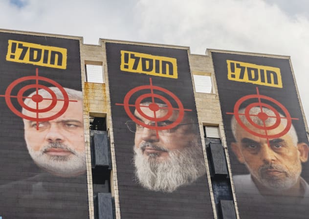 ELIMINATED BY the IDF post-Oct. 7: Hamas leaders Ismail Haniyeh (L) and Yahya Sinwar (R), and Hezbollah leader Hassan Nasrallah (C), seen at entrance to Jerusalem, Nov. 2024. 