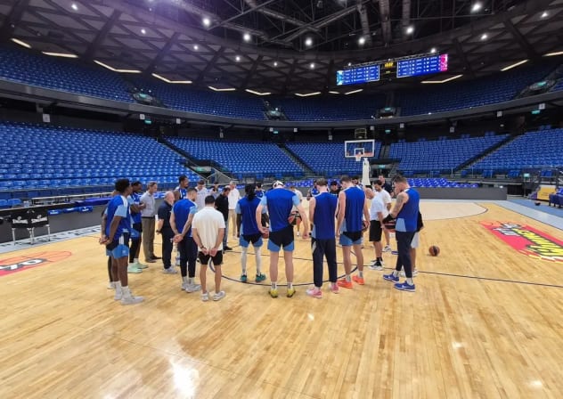 Maccabi Tel Aviv players during a minute of silence in memory of those killed and murdered on October 7.