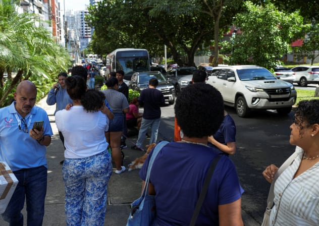 People gather in an open area after an earthquake struck near the southern coast of Panama, in Panama City, Panama, October 9, 2026.