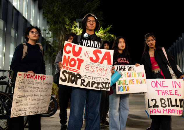 Cornell University students holds signs after a seven-hour-long sit-in protest representing the seven hours that a Jane Doe alleges she was sexually assaulted in a case involving seven members of Cornell’s Chi Phi fraternity, in Ithaca, New York, US, October 7, 2026.