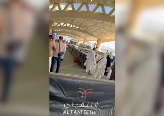 An ambulance is parked outside King Khalid International Airport after several people were wounded in an attack on the airport that forced a suspension of operations, according to Saudi Arabia's civil aviation authority, in Riyadh, Saudi Arabia, October 10, 2026.
