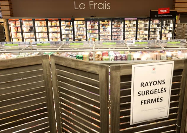 View of the closed frozen food aisle at a supermarket near Nantes after a cyberattack targeted refrigeration systems at French supermarket chains, causing food losses and fires at several stores, France, October 12, 2026.