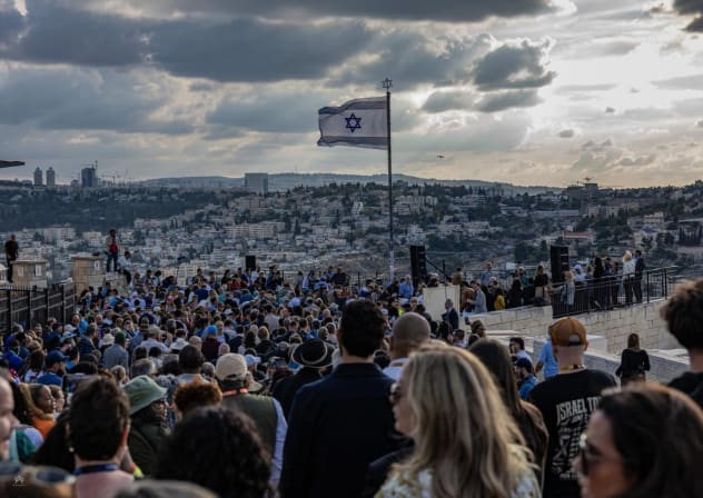 Participants gather for the international October 7 memorial at Jerusalem’s Southern Wall during the Friends of Zion Ambassador Summit.