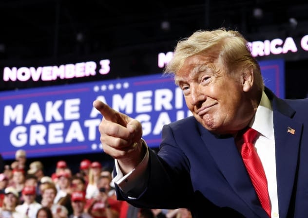 US President Donald Trump points toward supporters at the end of a campaign rally for US Senator Jon Husted (R-OH) and gubernatorial candidate Vivek Ramaswamy in Youngstown, Ohio, US, October 12, 2026