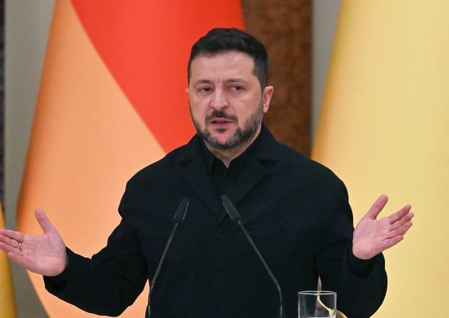 Ukraine's President Volodymyr Zelensky speaks during a press conference following talks with Germany's Chancellor in Mariinsky Palace following talks in Kyiv on October 4, 2026.