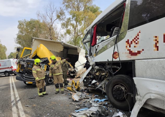 Emergency personnel respond to bus crash on Highway 91 in which one person was killed and and dozens more were injured on October 14, 2026. 