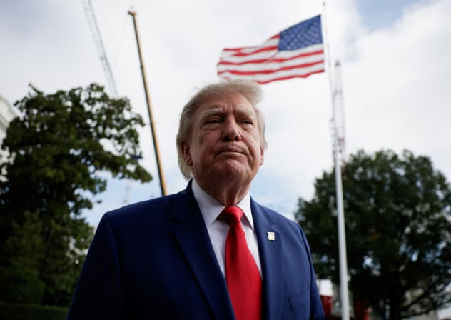 US President Donald Trump looks on while he speaks to reporters as he departs the White House for Joint Base Andrews en route to Dalton, Georgia, on the South Lawn of the White House in Washington, DC, US, October 16, 2026. 