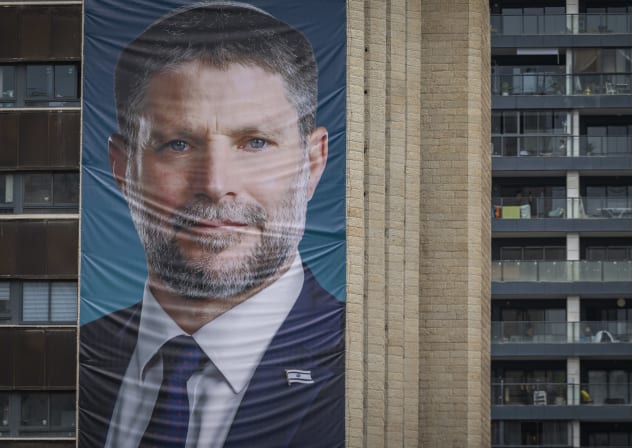 An election campaign billboard featuring Finance Minister and Religious Zionism Party (RZP) chairman Bezalel Smotrich is displayed on a hotel building in Jerusalem, ahead of Israel’s upcoming general elections, October 14, 2026.