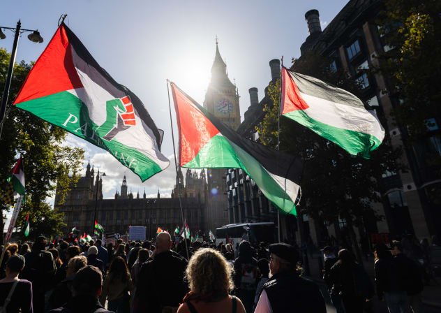  Protesters attend the National March For Palestine on October 10, 2026 in London, England. 