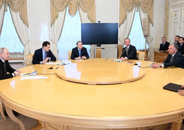 Members of the Russian delegation, including President Vladimir Putin and foreign policy adviser Yuri Ushakov, attend a meeting with US special envoy Steve Witkoff at the Constantine Palace in Saint Petersburg, Russia, October 21, 2026. 