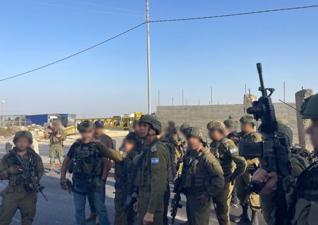 IDF troops operate on the scene of a terror attack near Hebron on October 23, 2026.