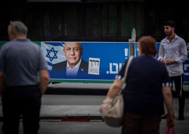 An election campaign poster featuring Yashar party chairman Gadi Eisenkot is displayed on a bus in Jerusalem, October 26, 2026