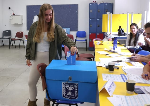 An Israeli woman casts her vote during Israel's 26th Knesset elections, October 27, 2026.