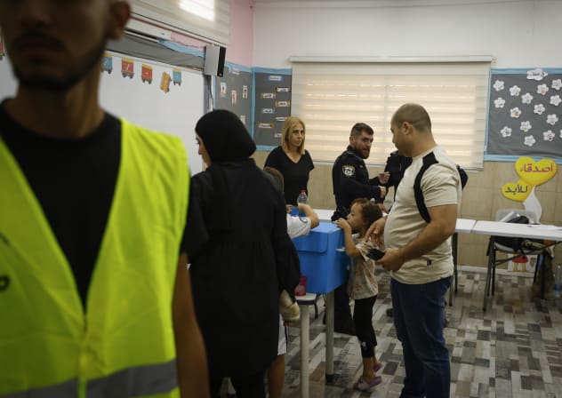 Arab Israelis cast their ballots at a polling station in Tayibe, central Israel, during Israel’s general elections, October 27, 2026.