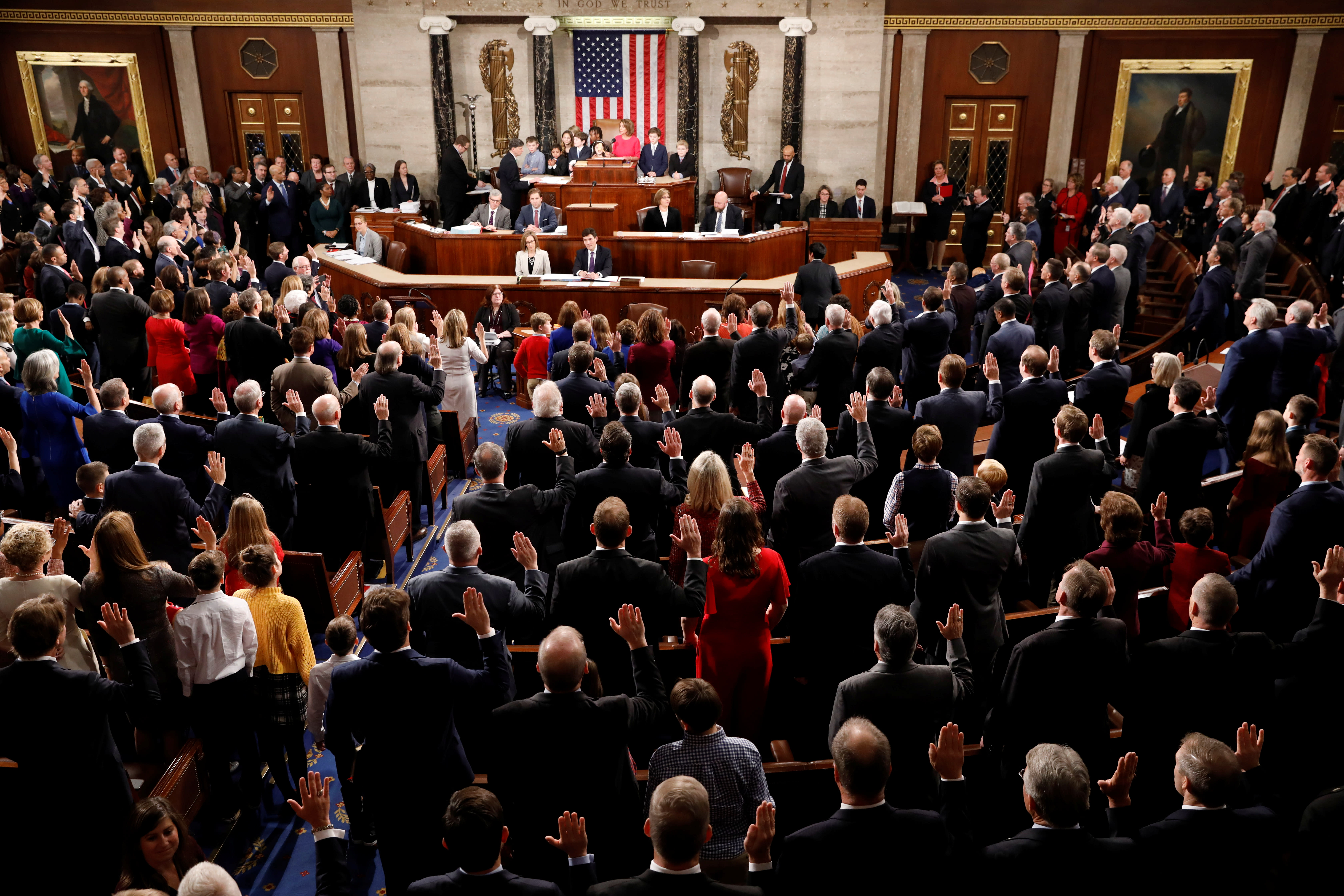 House Speaker Nancy Pelosi (D-CA) administers the oath of office to House members and delegates of the U.S. House of Representatives at the start of the 116th Congress inside the House Chamber on Capitol Hill in Washington, U.S., January 3, 2019 (photo credit: KEVIN LAMARQUE/REUTERS) House Speaker Nancy Pelosi (D-CA) administers the oath of office to House members and delegates of the U.S. House of Representatives at the start of the 116th Congress inside the House Chamber on Capitol Hill in Washington, U.S., January 3, 2019 (photo credit: KEVIN LAMARQUE/REUTERS)