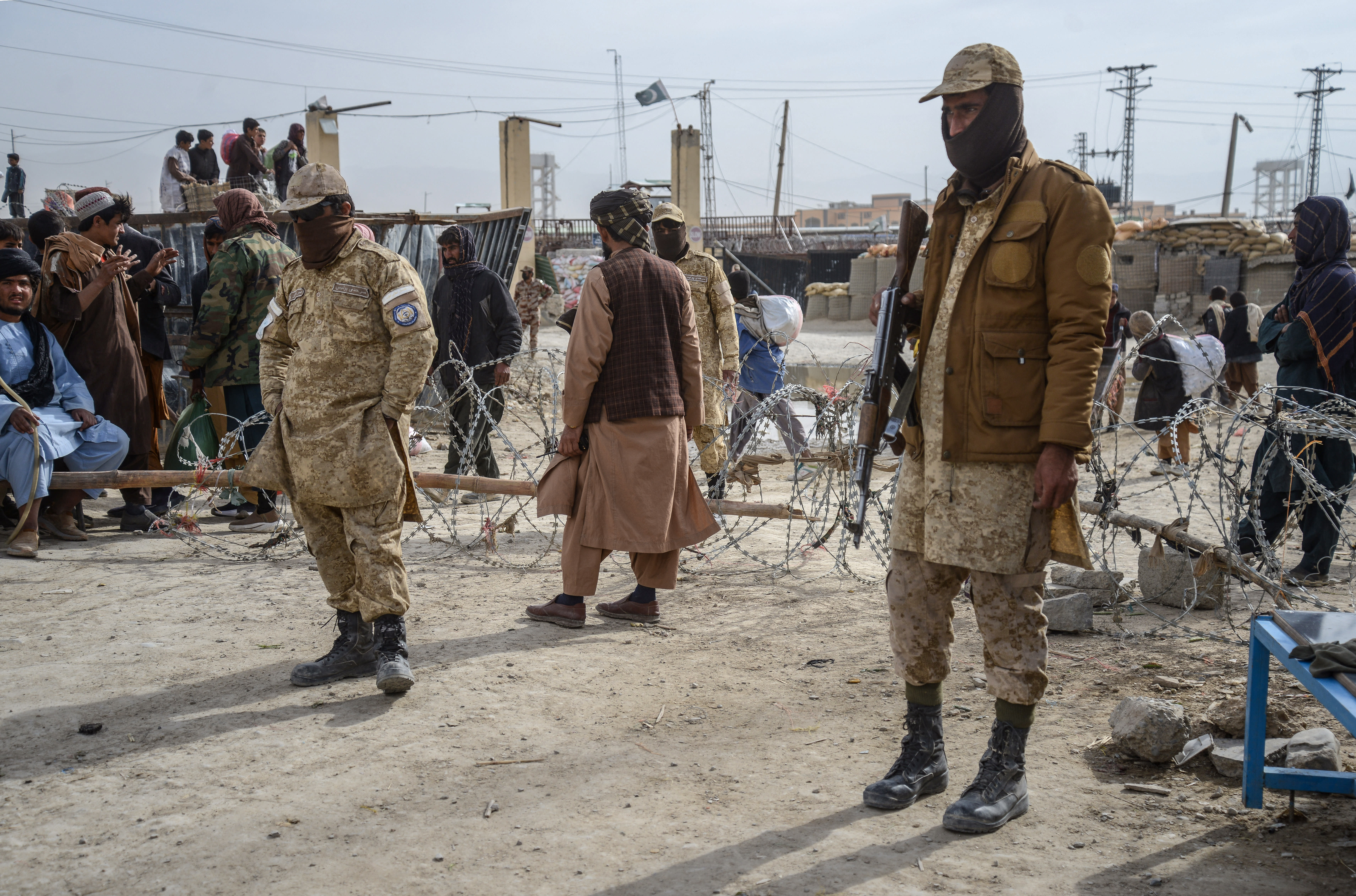 This photograph taken on December 29, 2025 shows Taliban security personnel standing guard near the zero-point border crossing between Afghanistan and Pakistan at the Spin Boldak district of Kandahar province. (photo credit: SANAULLAH SEIAM/AFP via Getty Images)