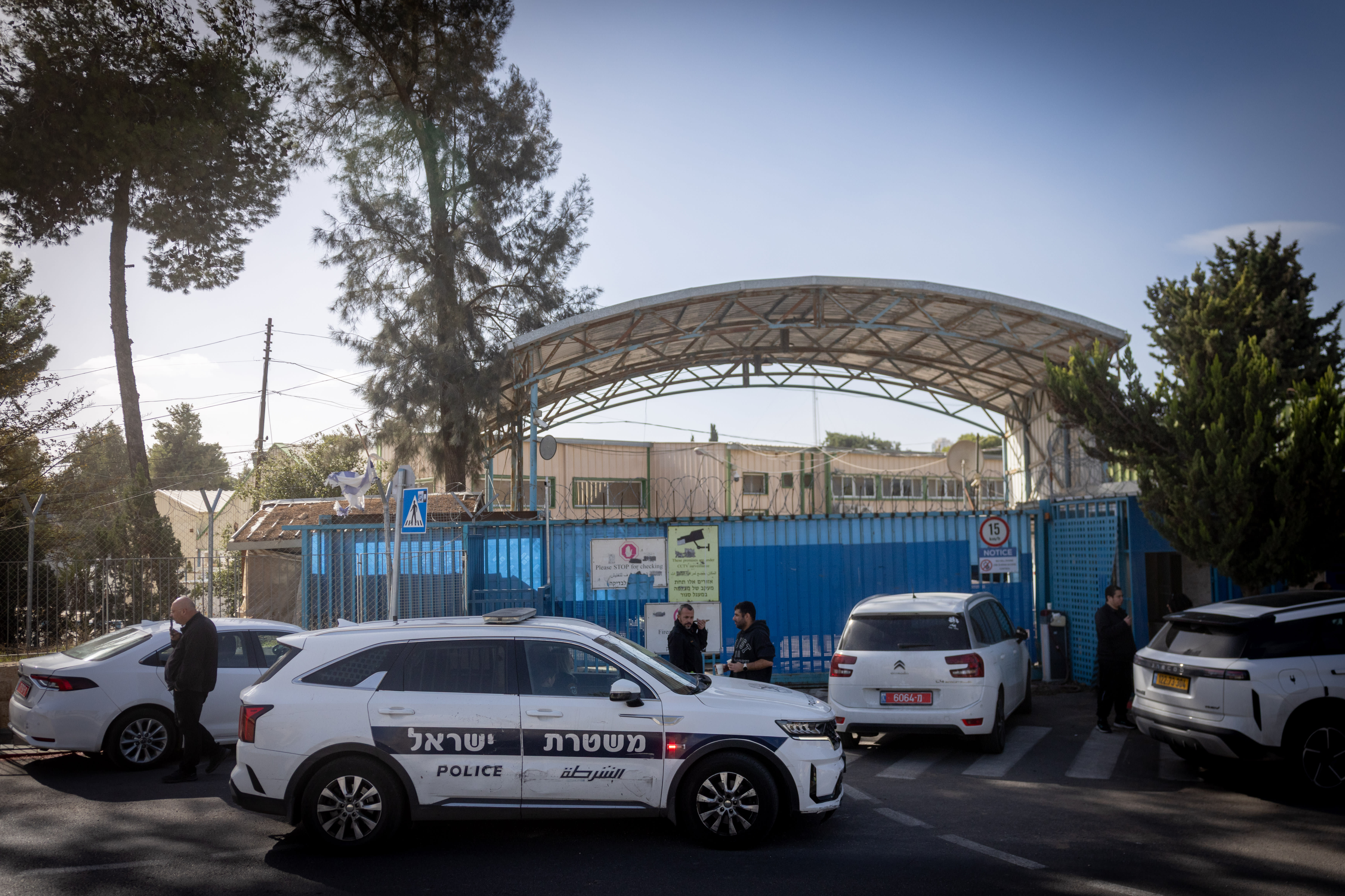 Israel Police forces seen outside the UNRWA center in Jerusalem, as part of a raid on the center, December 8, 2025 (photo credit: CHAIM GOLDBERG/FLASH90)