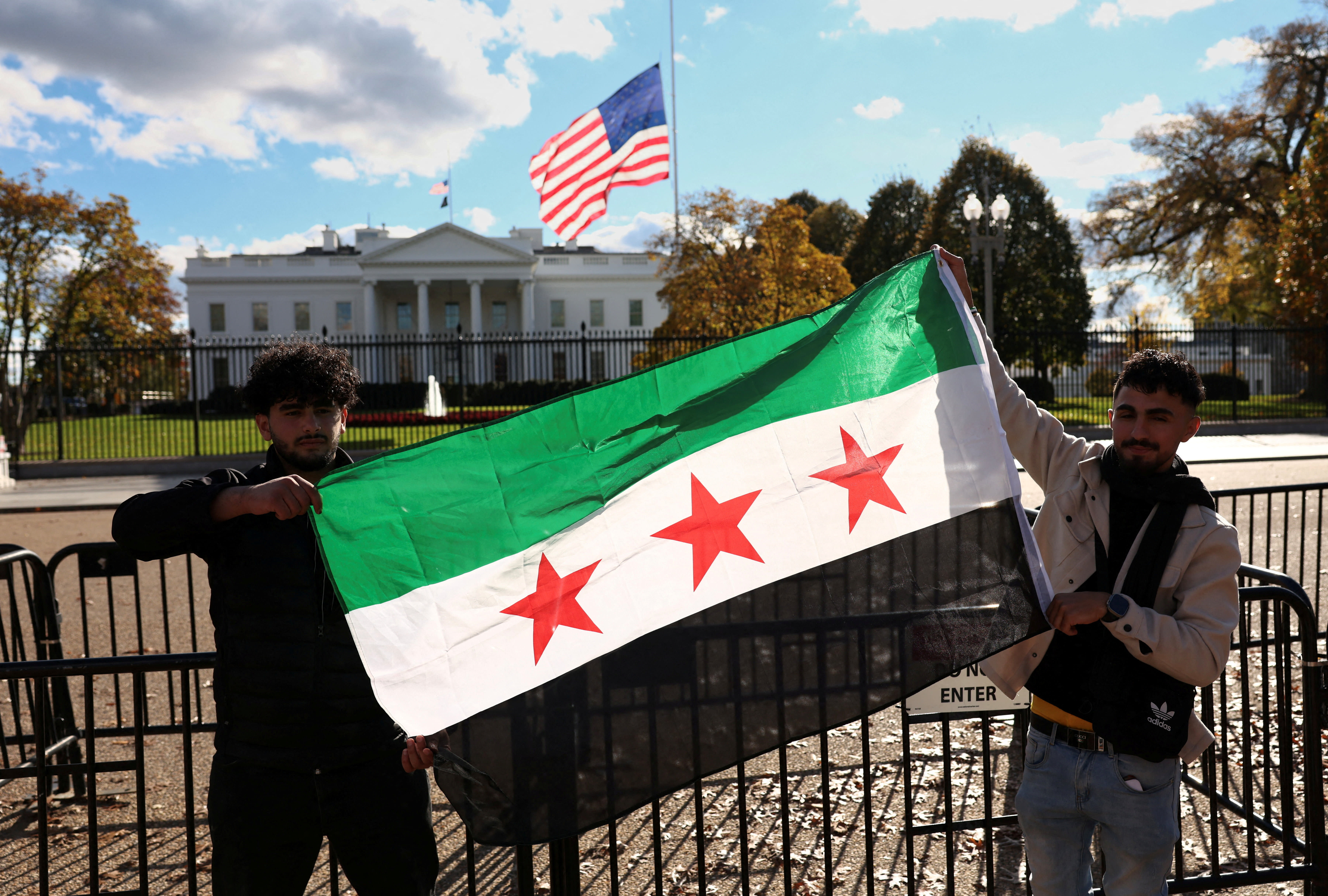A Syrian flag is displayed outside the White House following the meeting of US President Donald Trump and Syrian President Ahmed al-Sharaa in the Oval Office of the White House in Washington, DC, US, November 10, 2025.  (photo credit: KEVIN LAMARQUE/REUTERS)