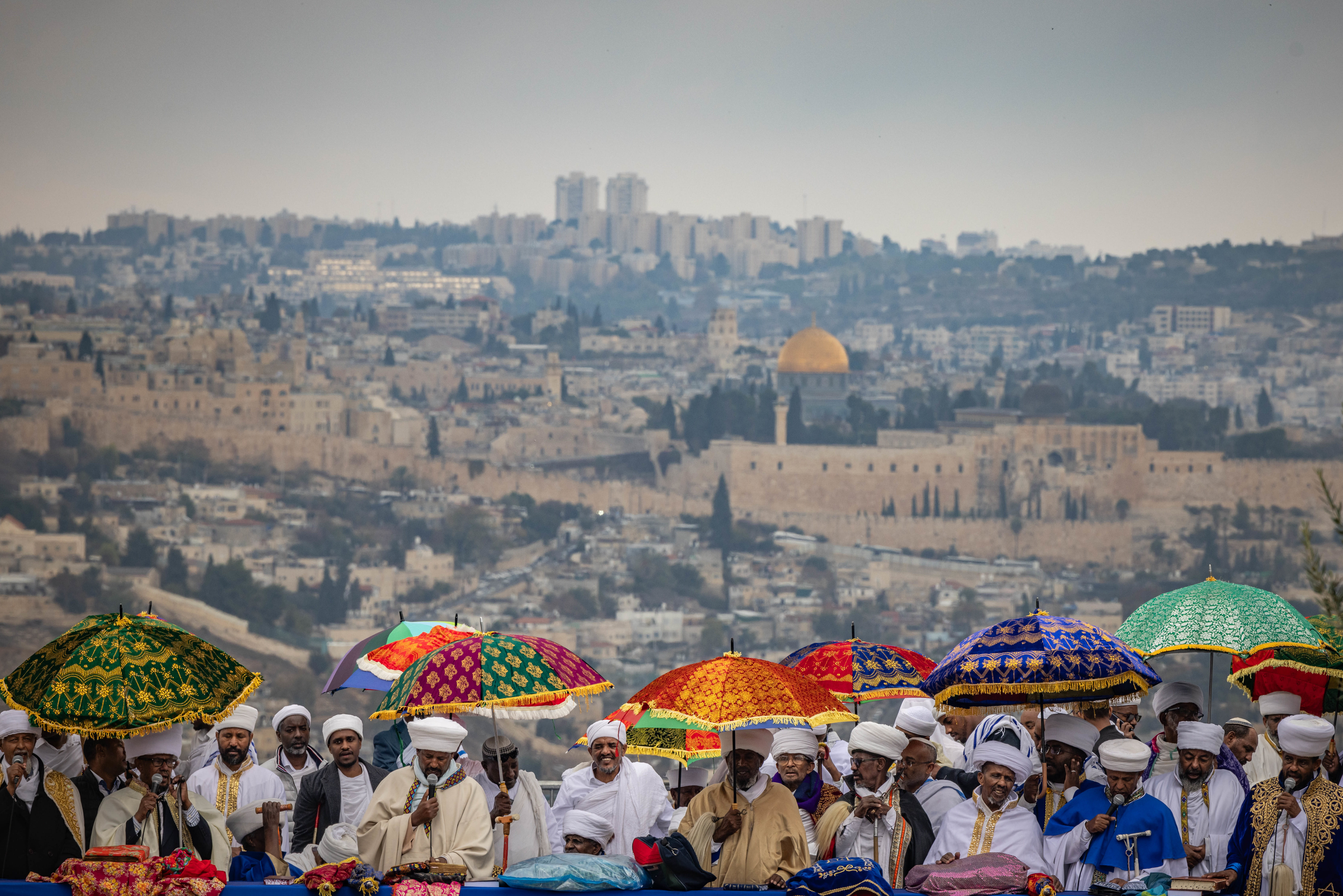 Ethiopian Jews take part in a prayer of the Sigd holiday on the Armon Hanatziv Promenade overlooking Jerusalem on November 28, 2024.  (photo credit: YONATAN SINDEL/FLASH90)