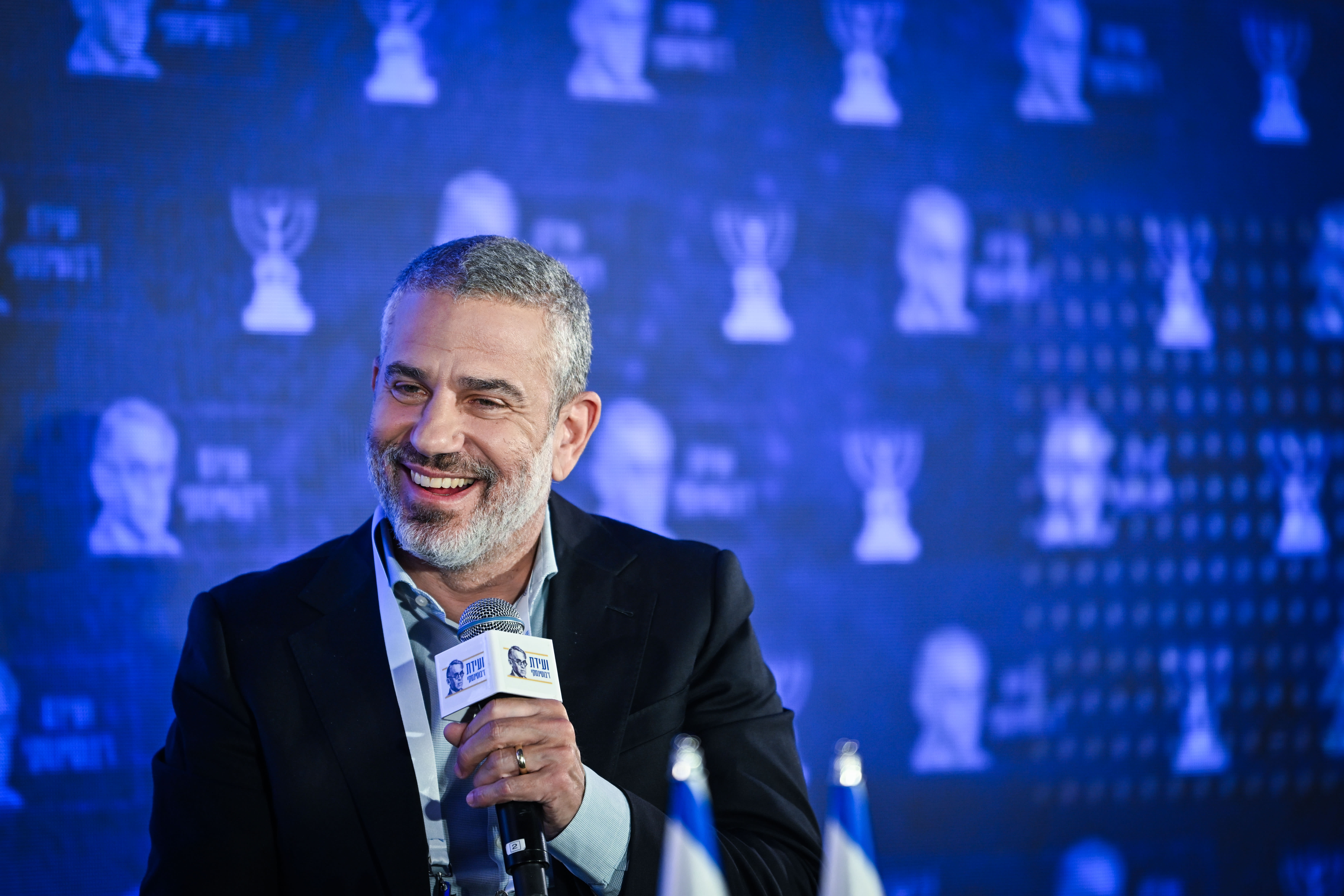 Channel 14 journalist Yinon Magal speaks during the Jabotinsky conference in Jerusalem, December 23, 2024. (photo credit: Arie Leib Abrams/Flash90)