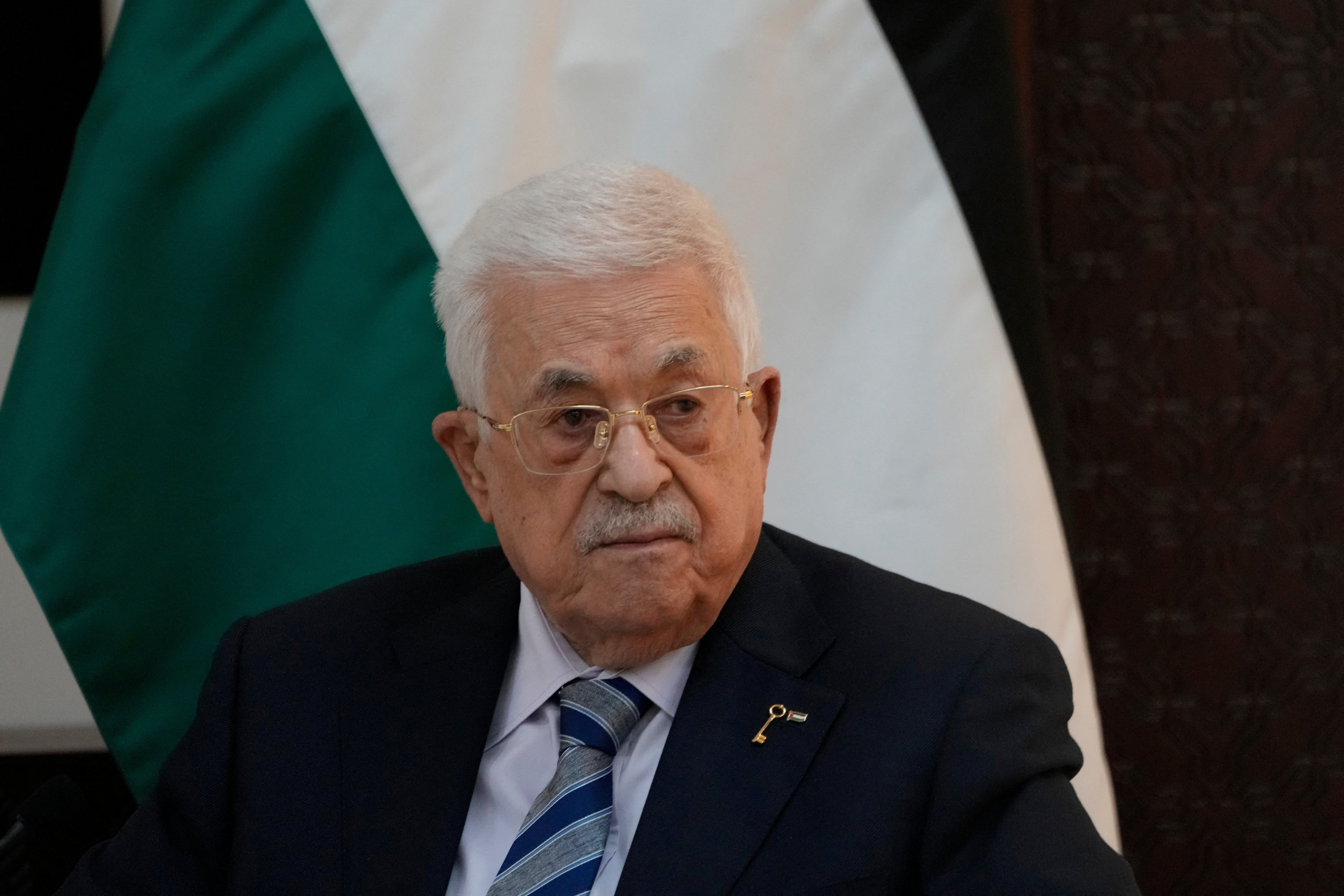 PALESTINIAN AUTHORITY President Mahmoud Abbas of Fatah (L) and Hamas politburo member Khalil al-Hayya. The two Palestinian organizations have the same goal of Israel’s destruction but take different paths to get there, the writer says. (photo credit: Nasser Nasser/Pool/Yamam al Shaar/Reuters)