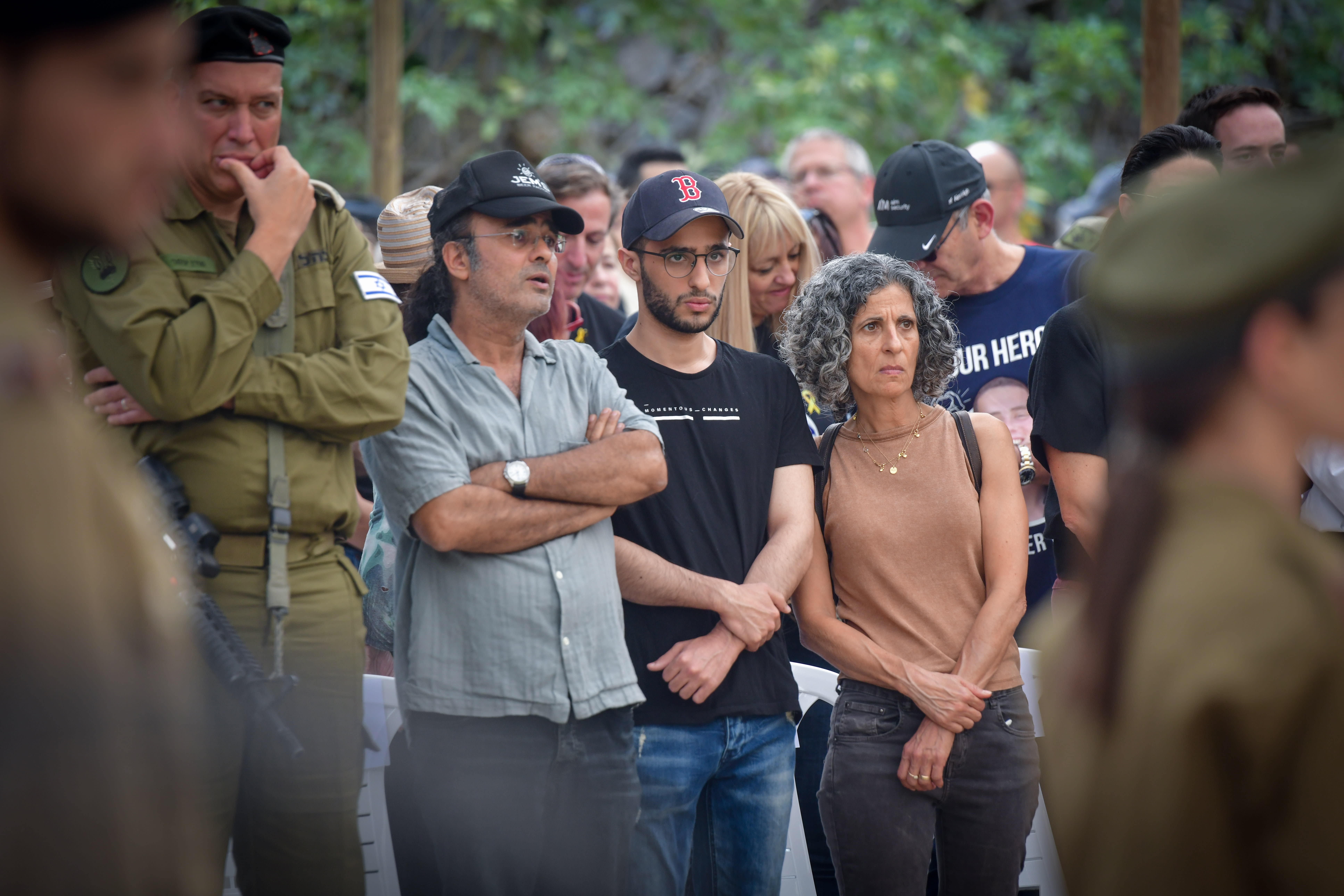 Released Israeli hostage Nimrod Cohen at the funeral of Israeli soldier Staff Sgt. Daniel Oz, at the military cemetery in Kfar Saba. (photo credit: AVSHALOM SASSONI/FLASH90)
