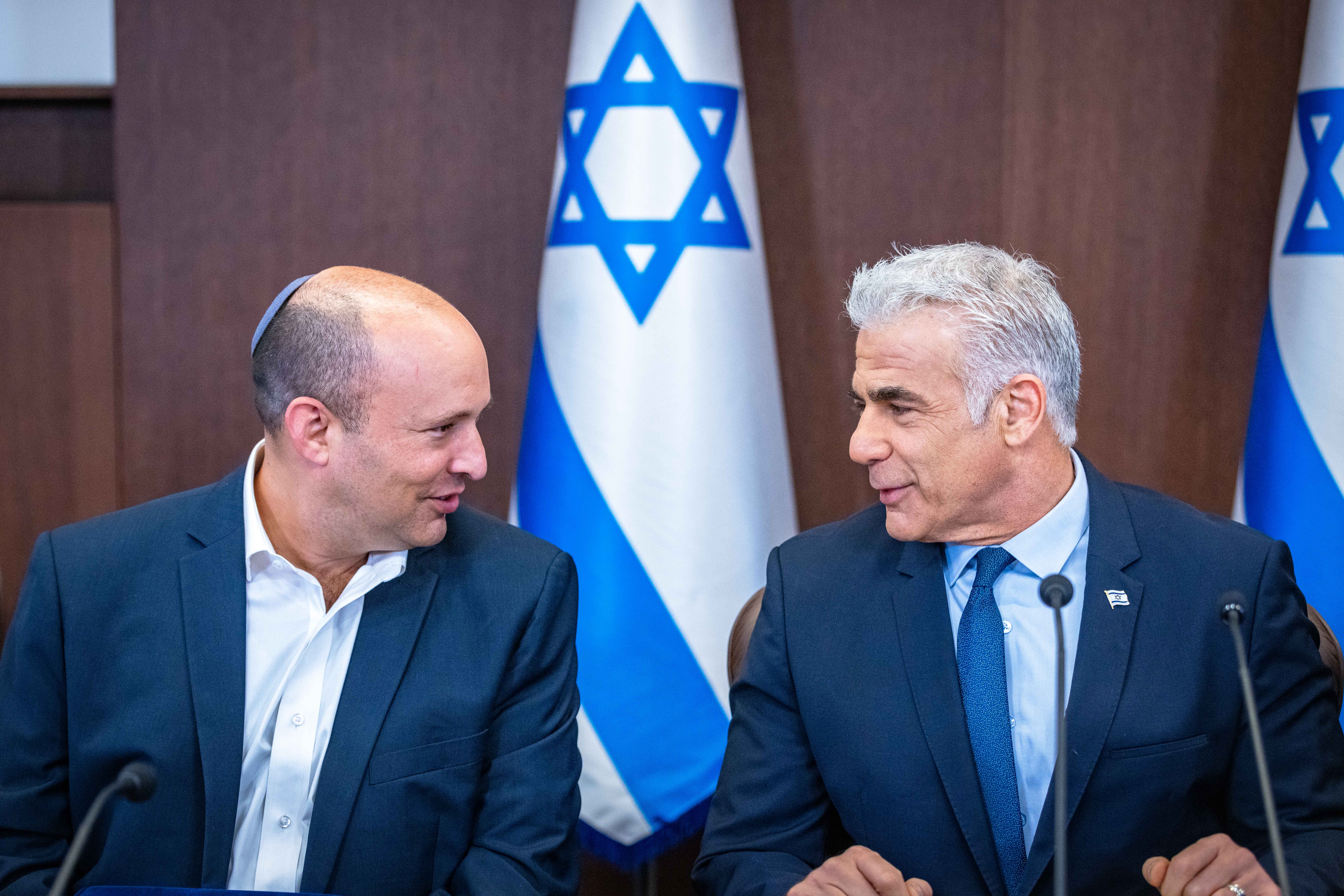Naftali Bennett and Yair Lapid hold a cabinet meeting at the Prime Minister