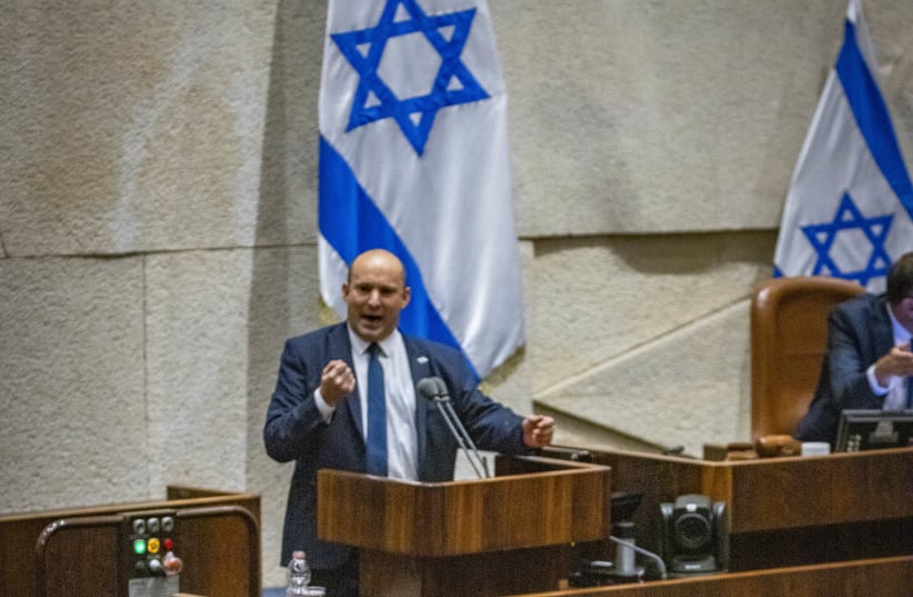 Former Israeli prime minister Benjamin Netanyahu attends a plenum session as Israeli prime minister Naftali Bennett speaks in the assembly hall of the Israeli parliament on May 16, 2022. 