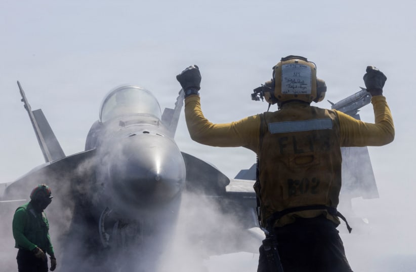 An F/A-18F Super Hornet prepares to launch from the US Navy Nimitz-class aircraft carrier USS Abraham Lincoln in support of the Operation Epic Fury attack on Iran, February 28, 2026.
