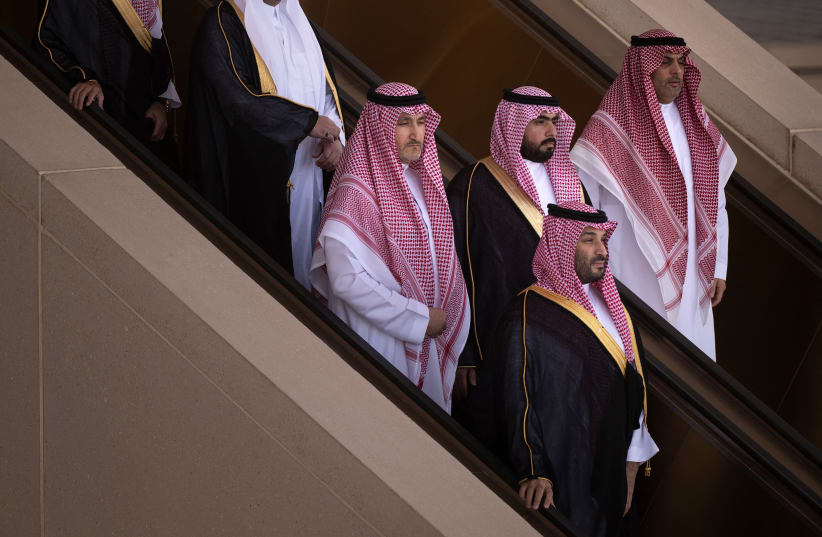 Saudi Crown Prince Mohammed bin Salman makes his way to greet US President Donald Trump upon his arrival in Riyadh, Saudi Arabia, May 13, 2025 (photo credit: BRENDAN SMIALOWSKI/AFP via Getty Images)