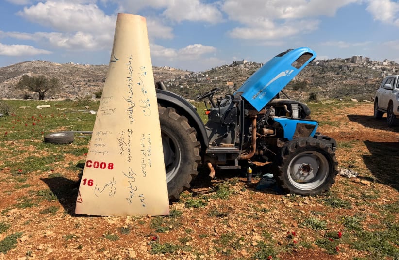 Iranian missile debris falls near children herding sheep in Binyamin, Israel on March 9, 2026. (photo credit: Binyamin Regional Council Spokesperson)