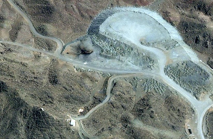 A satellite image shows a closer view of a destroyed vehicle at the Pickaxe Mountain facility in Natanz, Iran, March 7, 2026. (photo credit: VANTOR/HANDOUT VIA REUTERS)