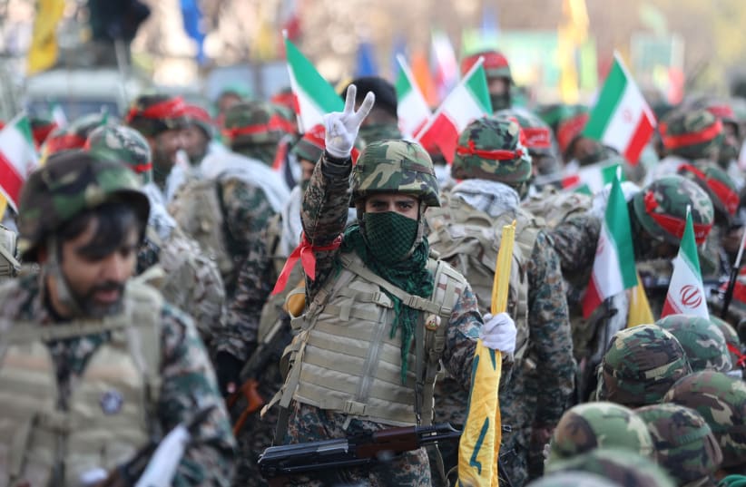 Basij militia members during an anti-Israel march in Tehran, January 2025; illustrative. (photo credit: MAJID ASGARIPOUR/WANA (WEST ASIA NEWS AGENCY) VIA REUTERS)