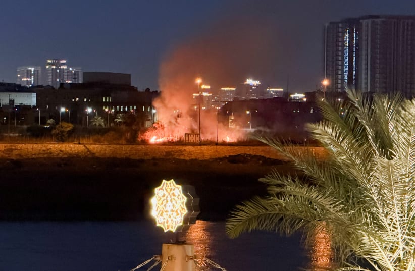 Smoke rises after an explosion at the US Embassy compound in Baghdad, Iraq, following a rocket and drone attack, according to security sources, March 17, 2026.