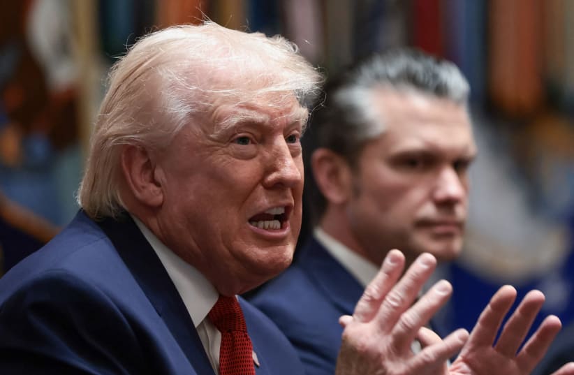 US President Donald Trump speaks next to Defense Secretary Pete Hegseth during a cabinet meeting at the White House in Washington, DC, US, March 26, 2026.
