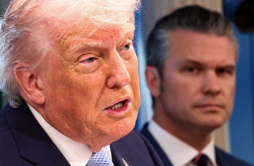 US PRESIDENT Donald Trump speaks, while Secretary of Defense Pete Hegseth looks on, as they hold a press conference in the James S. Brady Press Briefing Room at the White House in Washington, DC, US, April 6, 2026.