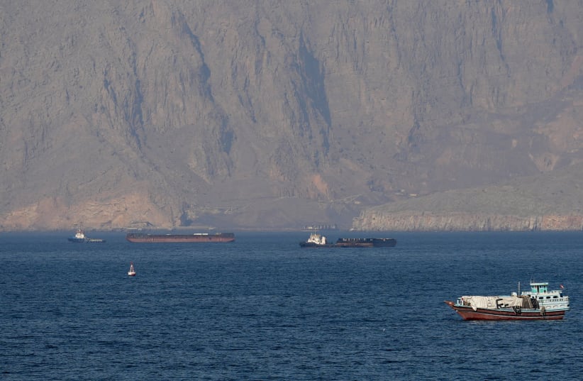 Ships and tankers in the Strait of Hormuz off the coast of Musandam, Oman, April 18, 2026.  (photo credit: REUTERS/Stringer TPX IMAGES OF THE DAY)