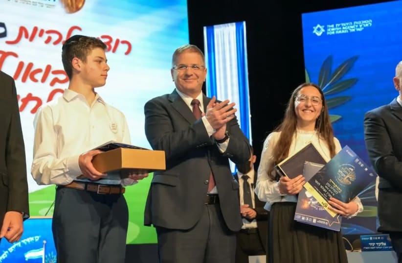 Hodaya Cohen and Akiva Schreier during the World Tanach Quiz 2026. (photo credit: Bruno Sharvit/GPO)