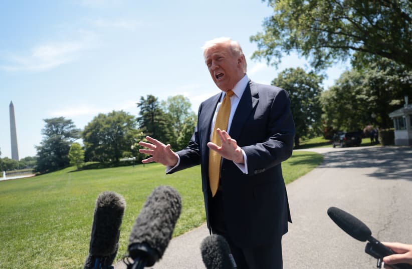 US President Donald Trump speaks to the press, ahead of departing the White House for Joint Base Andrews en route to Beijing, China, in Washington, DC, US, May 12, 2026.  (photo credit: REUTERS/EVELYN HOCKSTEIN)